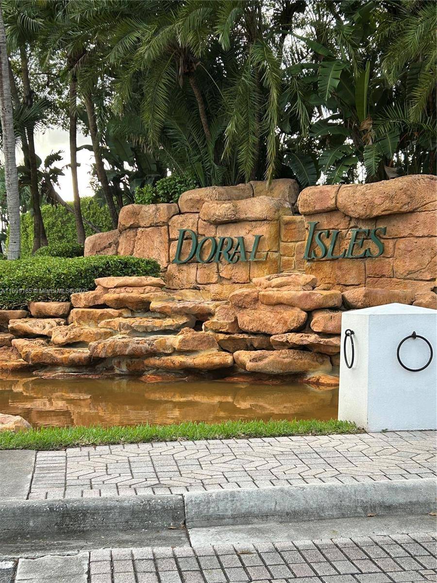 Light, height, and modern elegance flow through every corner of this fully remodeled luxury home in Doral Isles.