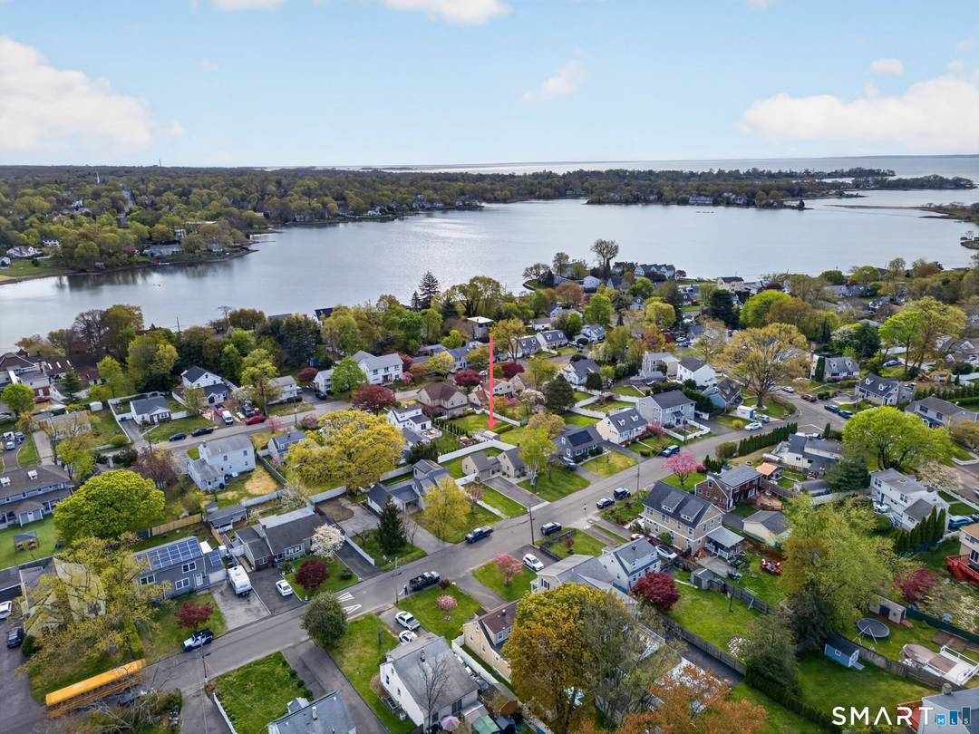 Experience true pride of ownership in this beautifully maintained Cape located in the highly sought after Cove neighborhood of Stamford.
