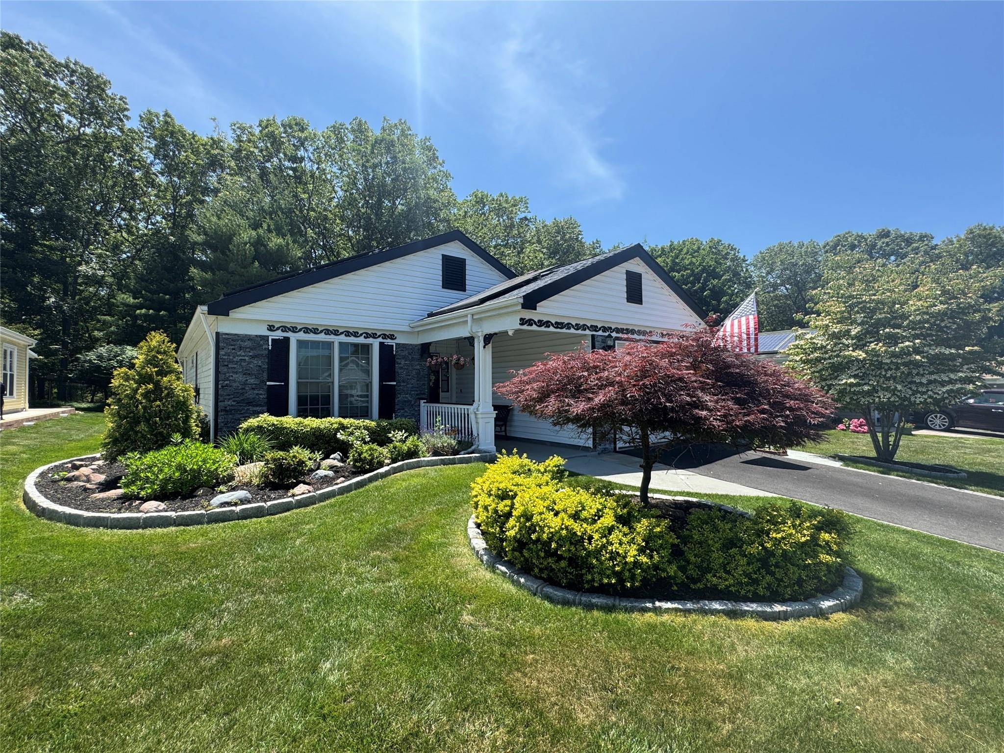 Tucked away in a serene, wooded location, this expanded Heather model offers the ideal blend of style and functionality in one of the area s most desirable 55 communities.