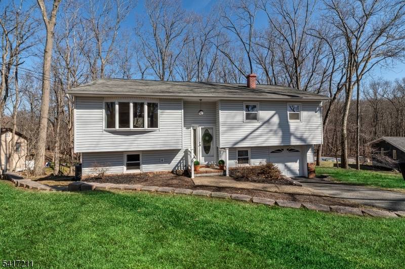 Welcome home to this charming 3 bdrm, 2 ba split level home quietly nestled on a peaceful street in the highly desirable Skyline Lakes.