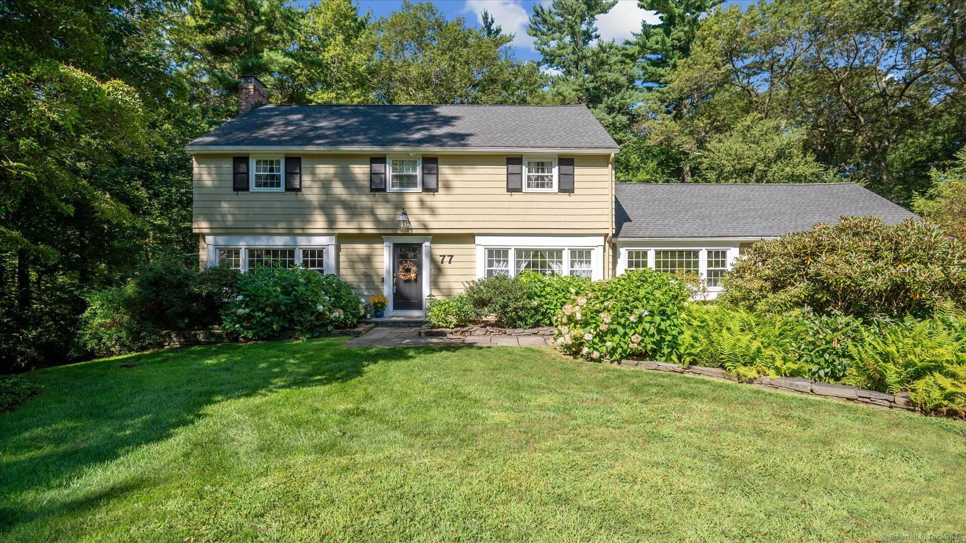 Welcome to this warm inviting Colonial nestled in one of the area's most desirable neighborhoods.