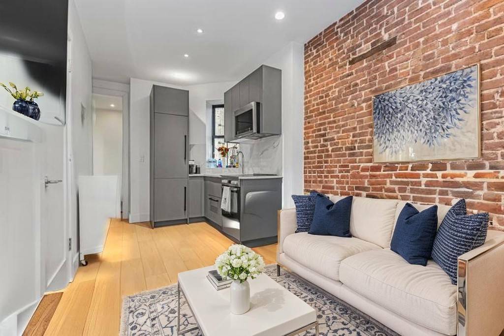 Fully Renovated modern 2BR 1BA Home in the Highly sought after Aurora Building in Prime Hells Kitchen.