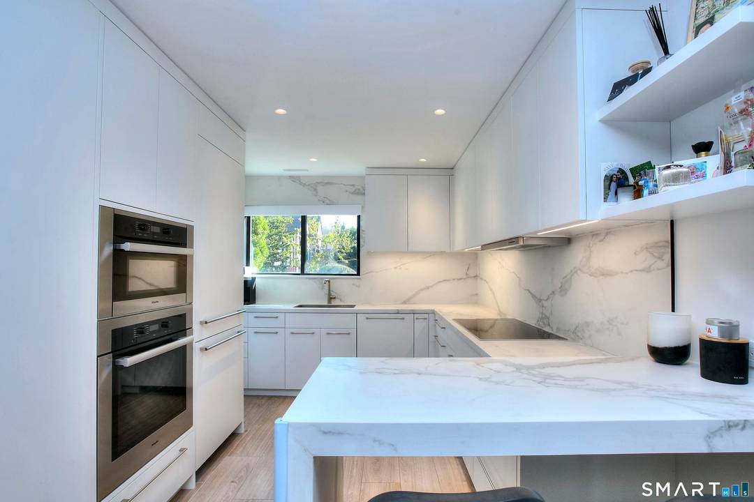 Welcome to this exceptional townhome in one of Stamford most sought after communities, The Manor.