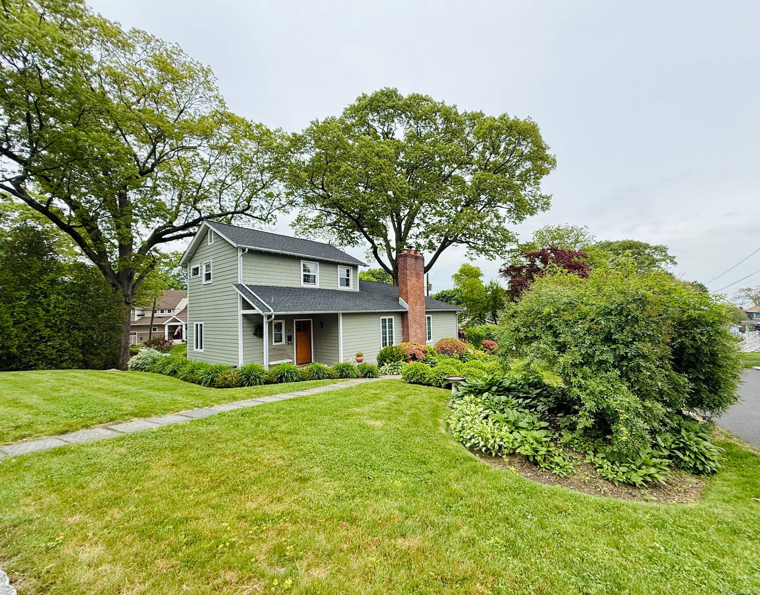 Updated 3 bed 2 full bath on quiet street with water views off backyard deck and access to bayview beach.