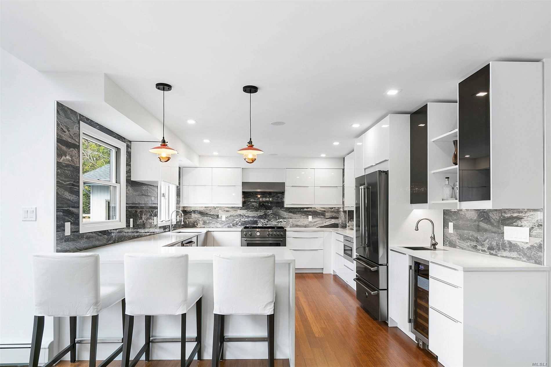 This stylish Old Harbor Colony contemporary has been totally redesigned and finished beautifully for all your friends and family.