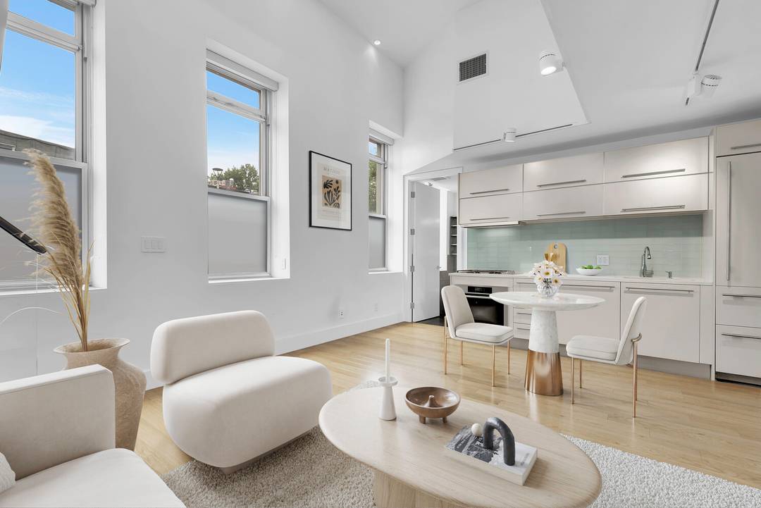 Major Price Reduction ! Sunlit and sophisticated, this striking triplex sits directly across from McCarren Park, offering the perfect blend of modern design and everyday comfort.