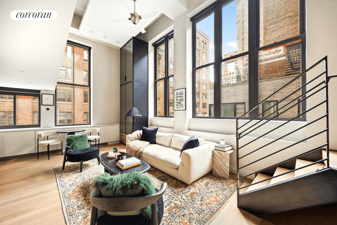 Welcome to this impeccably renovated TRUE 1 BED DUPLEX located in one of the West Village's most beloved buildings The Printing House Condominium.