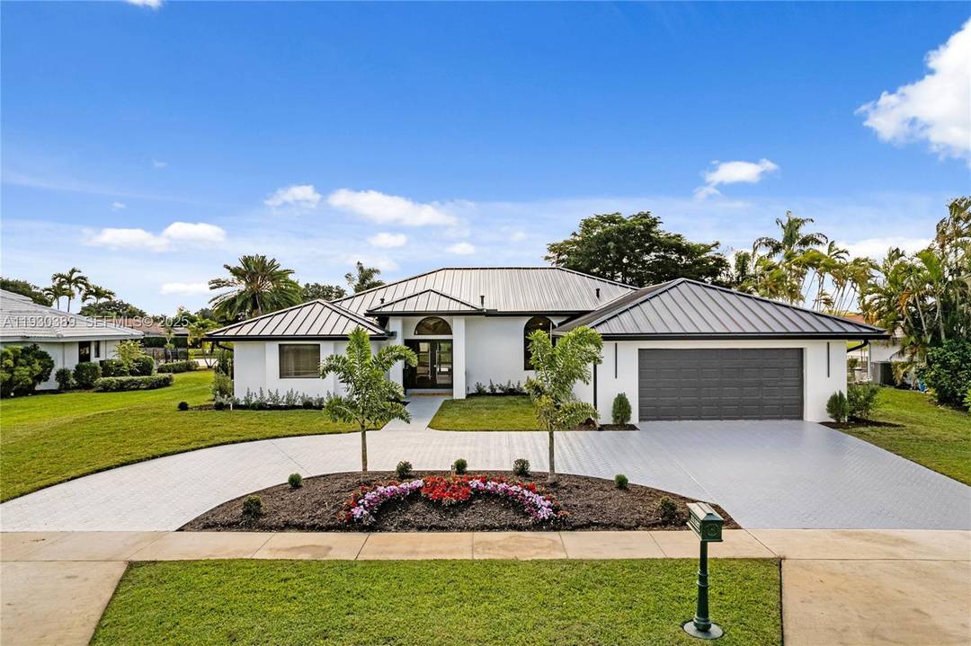 Open House December 20th 11 3pm A rare opportunity to own a fully modernized home in Boca Woods country club.