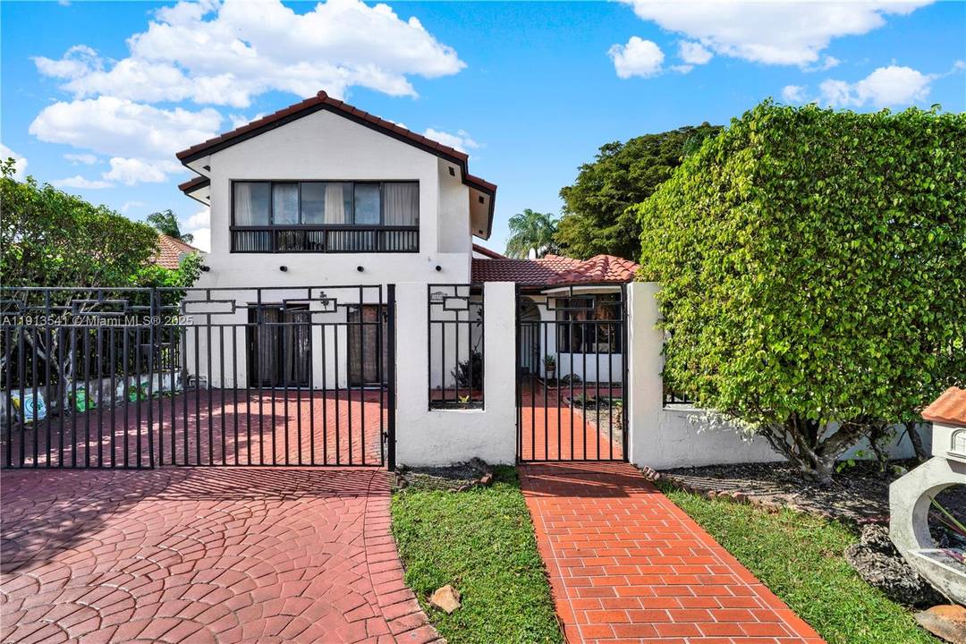 Welcome to this exquisite two story corner unit, offering unparalleled versatility and luxury.