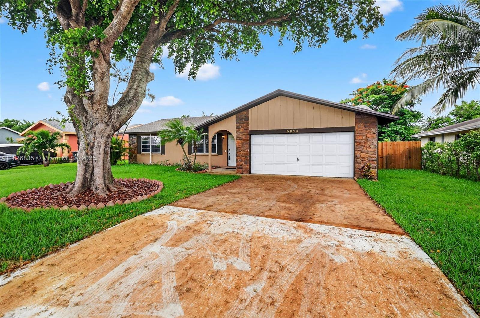 YOUR WAIT IS OVER..... Immaculately Maintained 3 Bedroom, 2 Bath, 2 Car Garage Home with an Enormous 23'x11.
