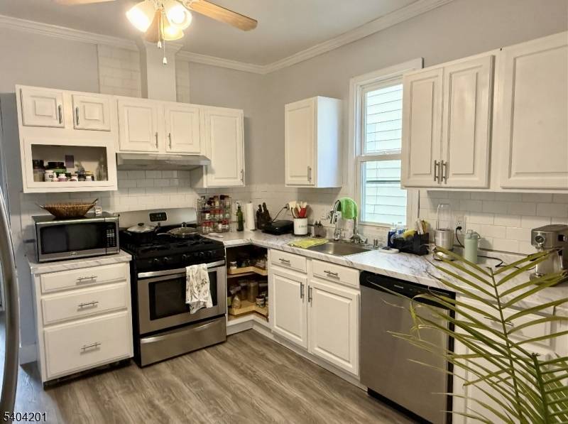 Welcome to this 2 Family Property located in a desirable area of Elizabeth City, Near Shopping, schools, public transportation and only 5 minutes away from EWR Airport.