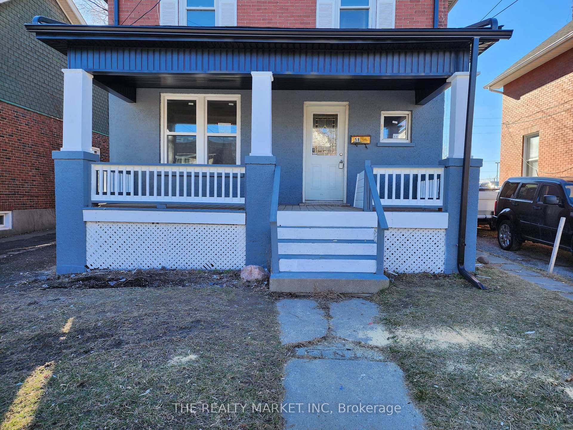 Renovated main floor unit, can be used as an office, one block from the Courthouse ; use of backyard ;