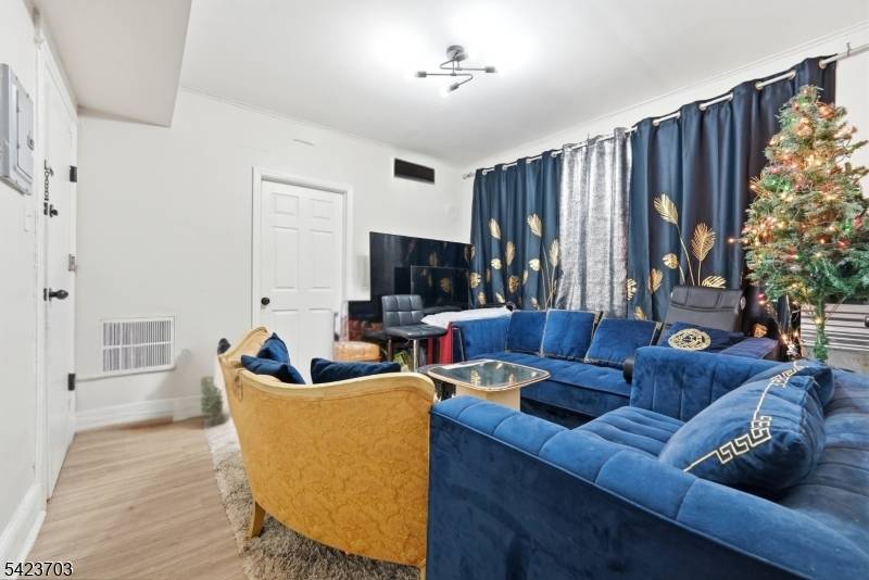 This fully renovated 3 family, updated in 2021, sits on an oversized lot and generates strong rental income.