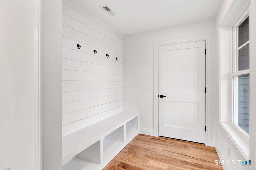 Welcome to 100 Tashua Road, a beautifully crafted 4 bedroom, 2.