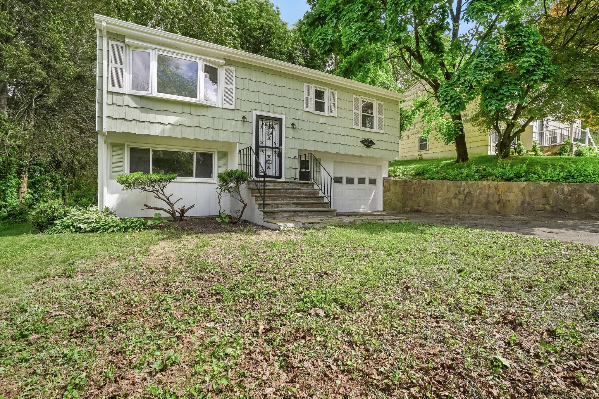 Remodeled raised ranch style home ideally located in the sought after West Norwalk market area.