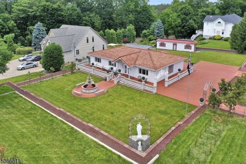 Experience this exquisite Roman Spanish Villa Inspired Estate located in highly sought after Great Notch section of Little Falls less than 30 minutes from NYC.