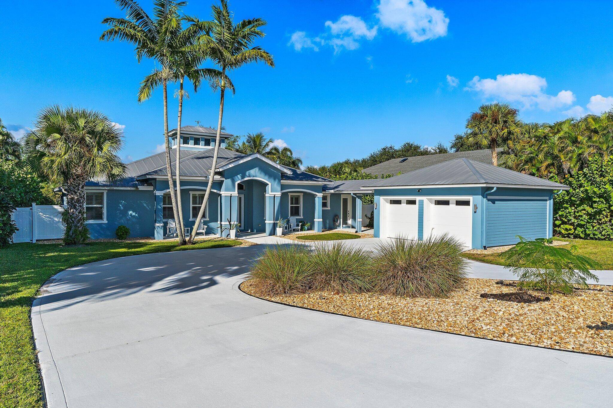 Beautiful updated custom built pool home in the exclusive Papaya Estates of Hobe Hills.