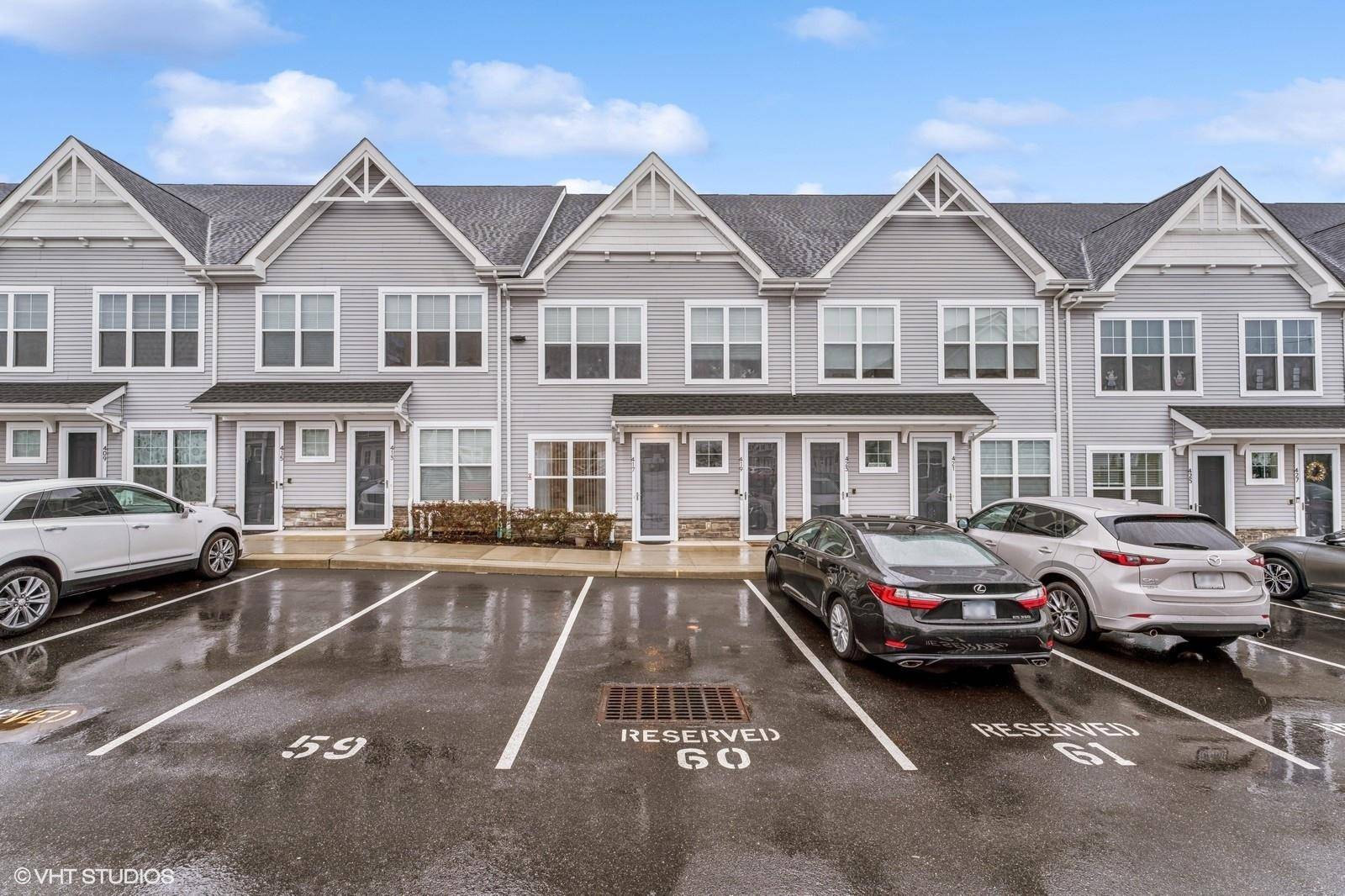 Luxurious 62 condominium with outstanding amenities in a prime location across from the Clubhouse and Pool.