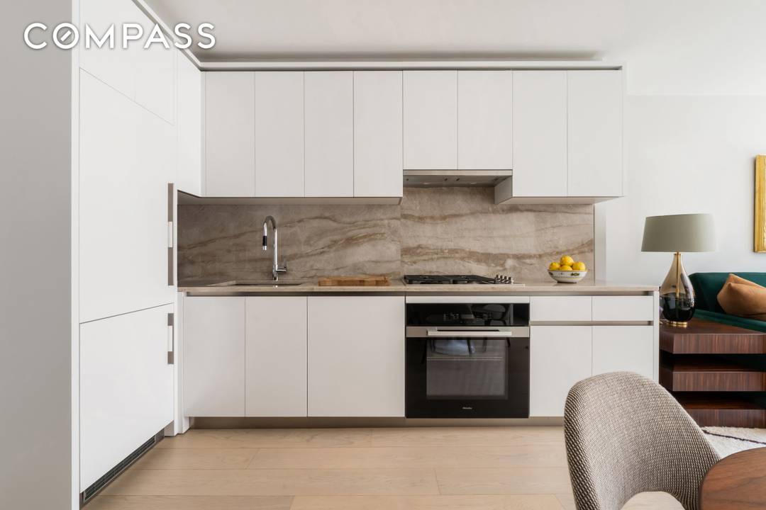 Residence 517 at 450 Washington Street is a sun drenched, meticulously designed one bedroom overlooking the historic architecture and leafy treetops of Tribeca.