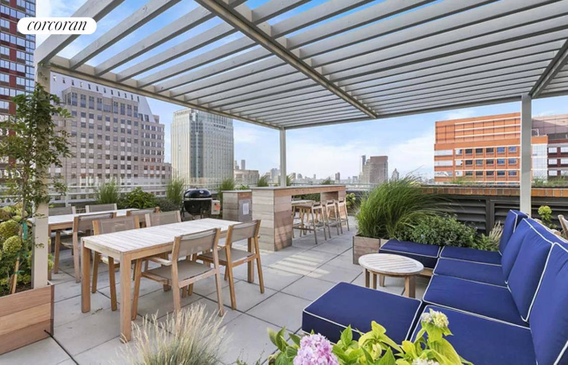 Experience contemporary elegance in this 2, 132 square foot BellTel Loft situated within the 1929 Landmarked Art Deco Building at 365 Bridge Street.