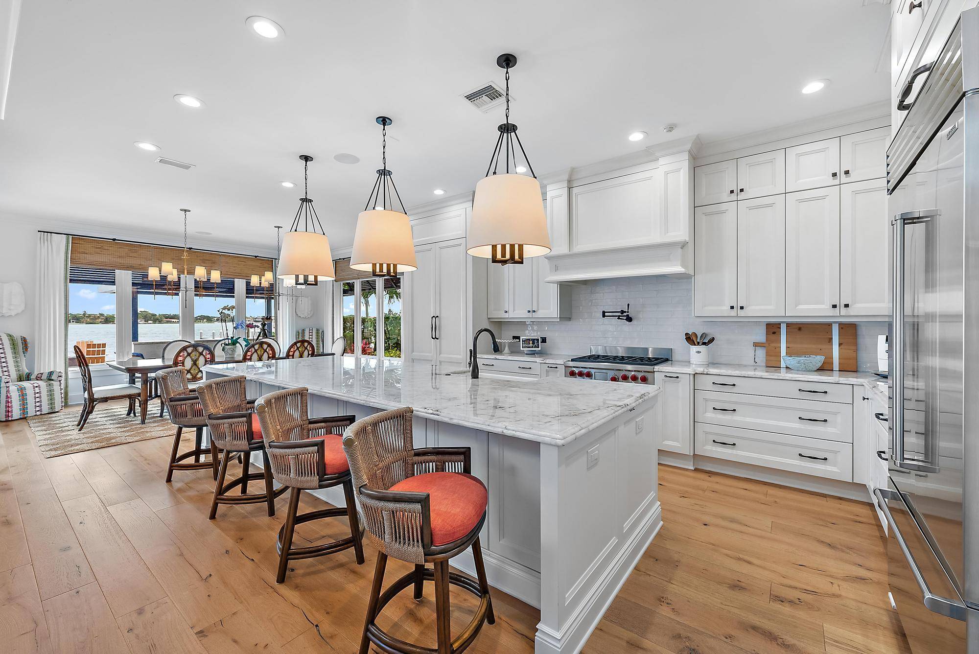 This privated and gated riverfront retreat will take your breath away where luxury meets lifestyle on the widest stretch of the Loxahatchee River.