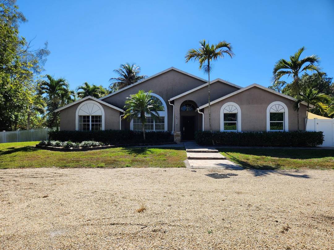 Welcome to this beautifully maintained 4 bedroom, 2 bath den CBS home located in the heart of The Acreage.