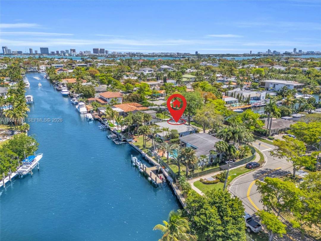 Rare opportunity to create your waterfront dream in prestigious Keystone Point, a gated enclave in North Miami known for privacy and security.