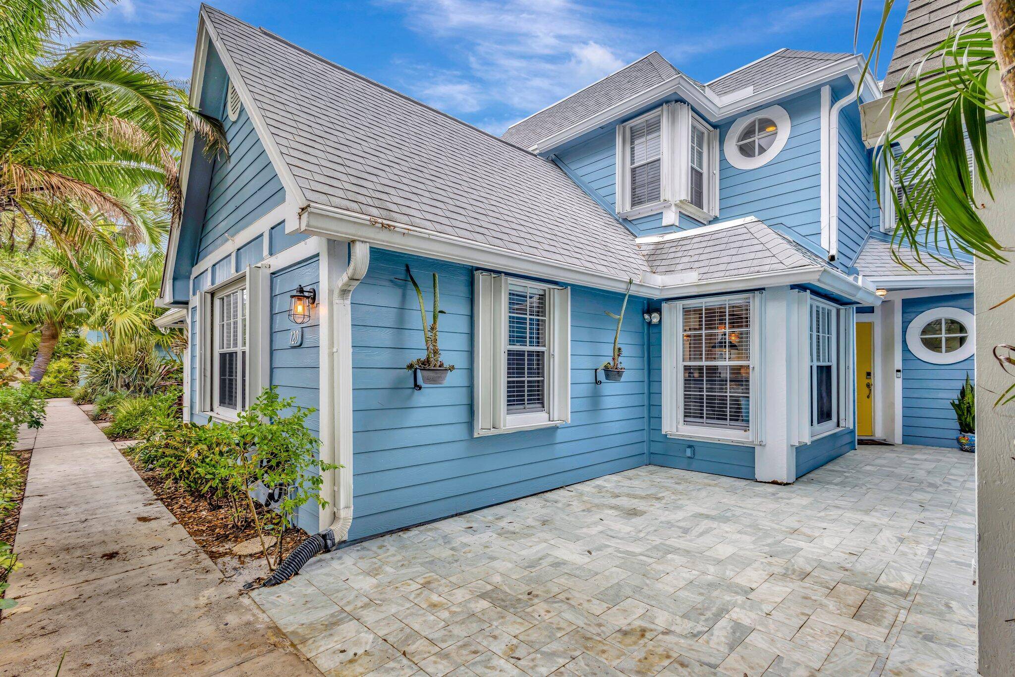 FULLY FURNISHED TURN KEY beautifully updated 3 bedroom 2 bath beach townhouse in gated Ocean Dunes in Jupiter !