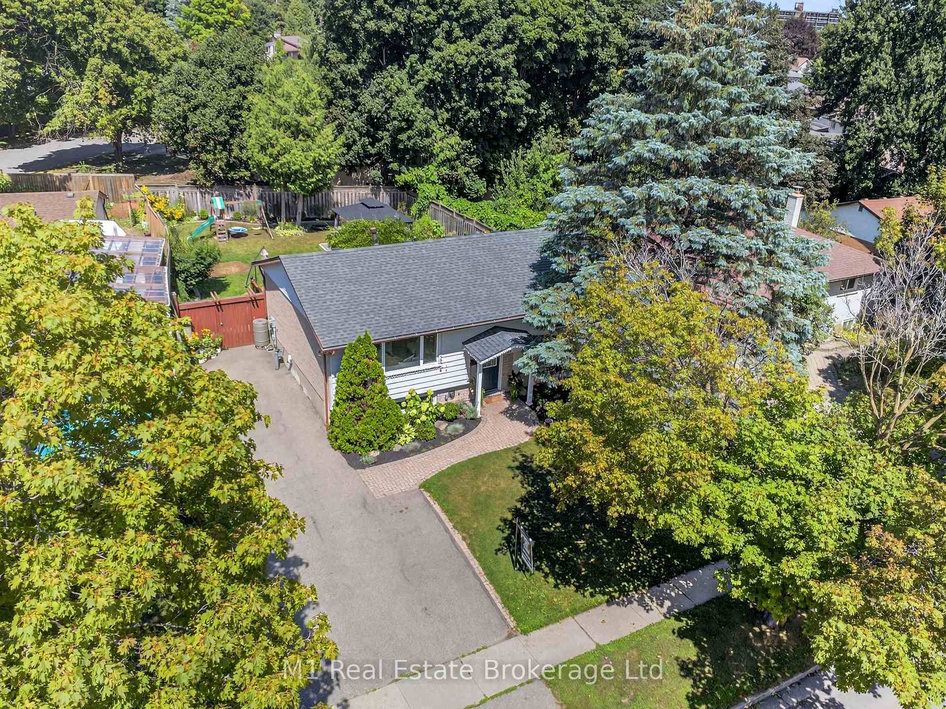 Picture this you pull into the spacious driveway of 91 Rhonda, tucked in Guelphs vibrant west end, with room for all your cars and more.