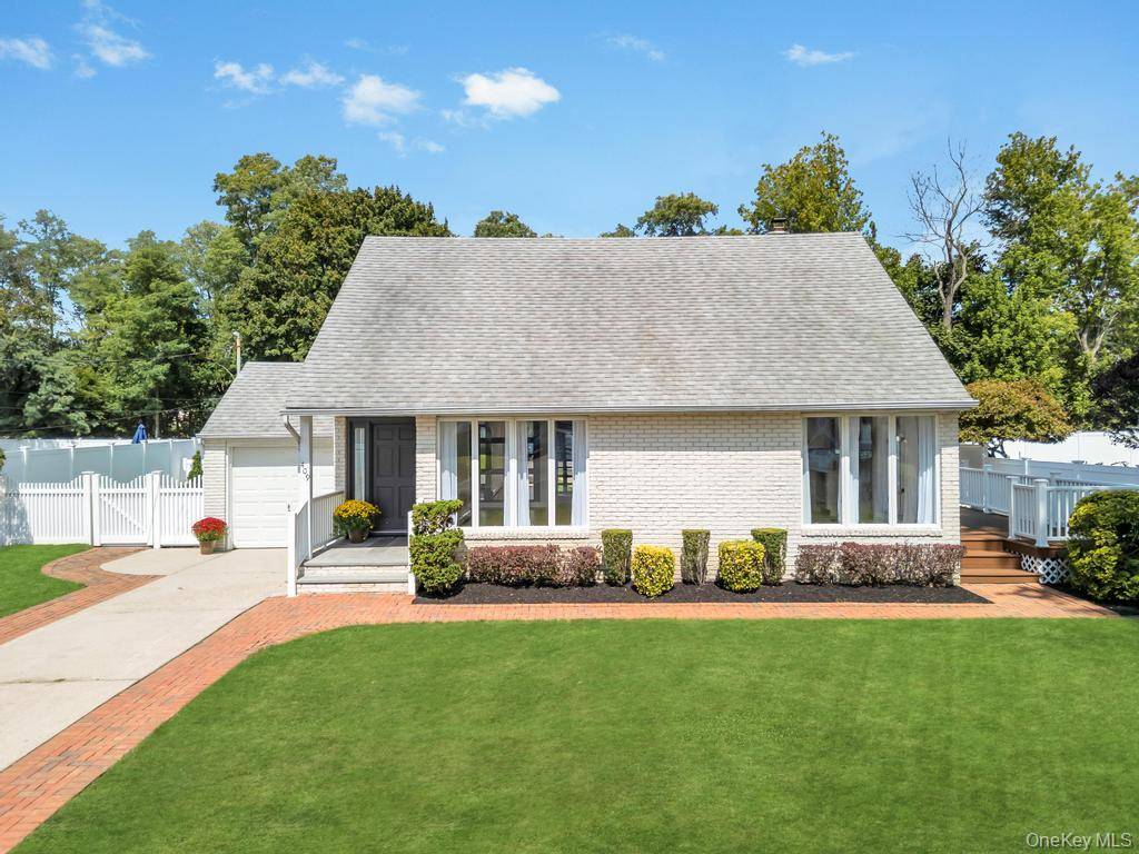 Stunning Split Level Home In The West Islip School District.