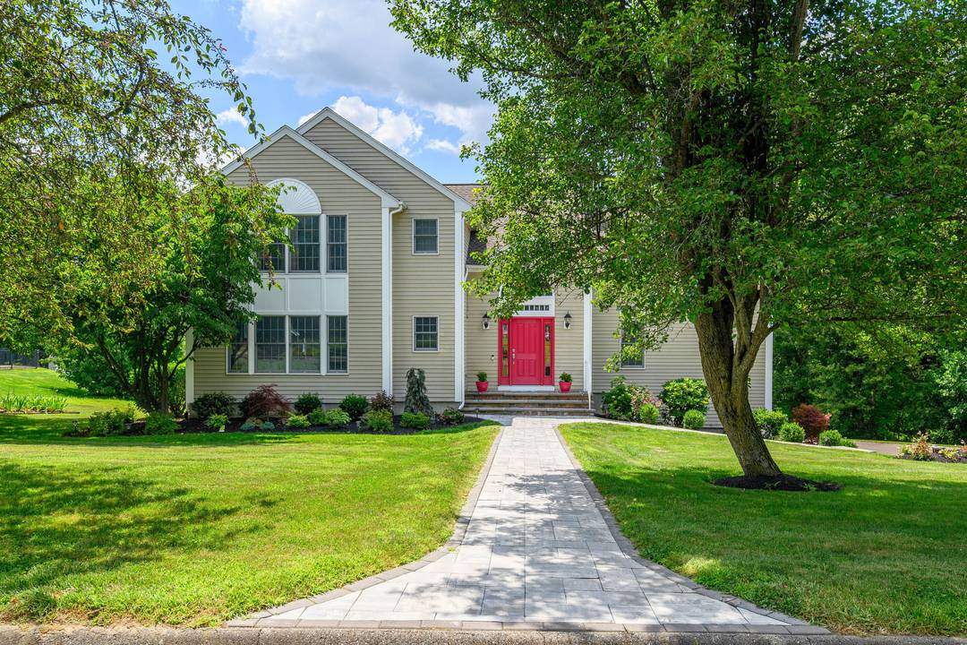 Discover refined living in this beautifully renovated four bedroom, two full and three half bath Colonial, perfectly positioned on a quiet cul de sac of similar fine homes.