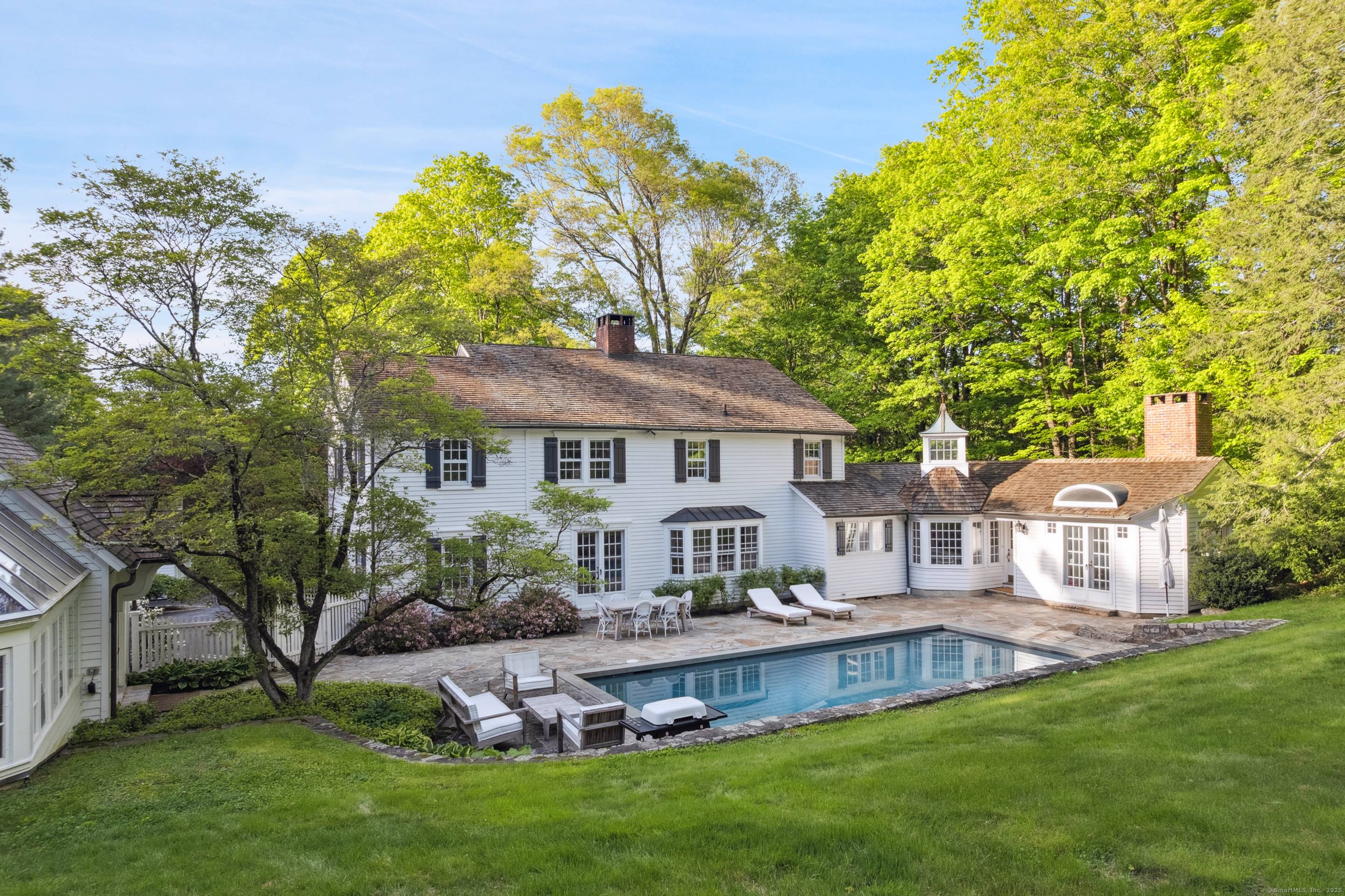 Welcome to 336 Old Branchville Rd, a beautiful historic Colonial home set on park like grounds.