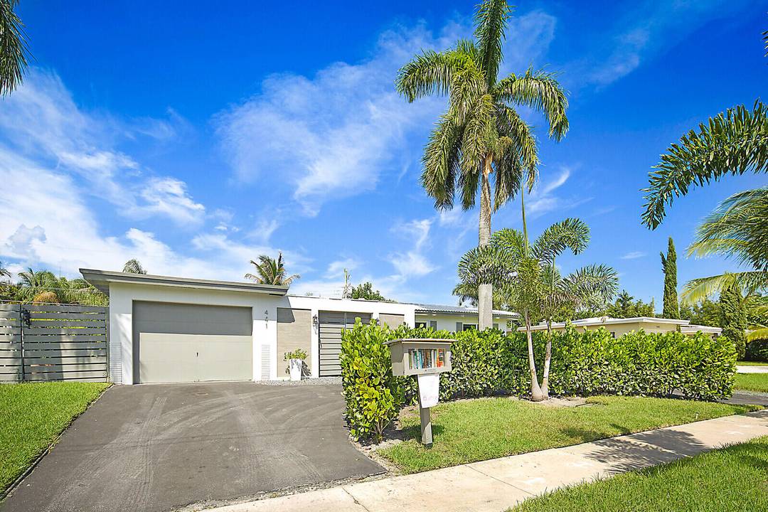 Located in desirable East Boca, this beautifully remodeled 2 bedroom, 2 bath pool home with a versatile bonus room is move in ready and offers exceptional comfort and efficiency.