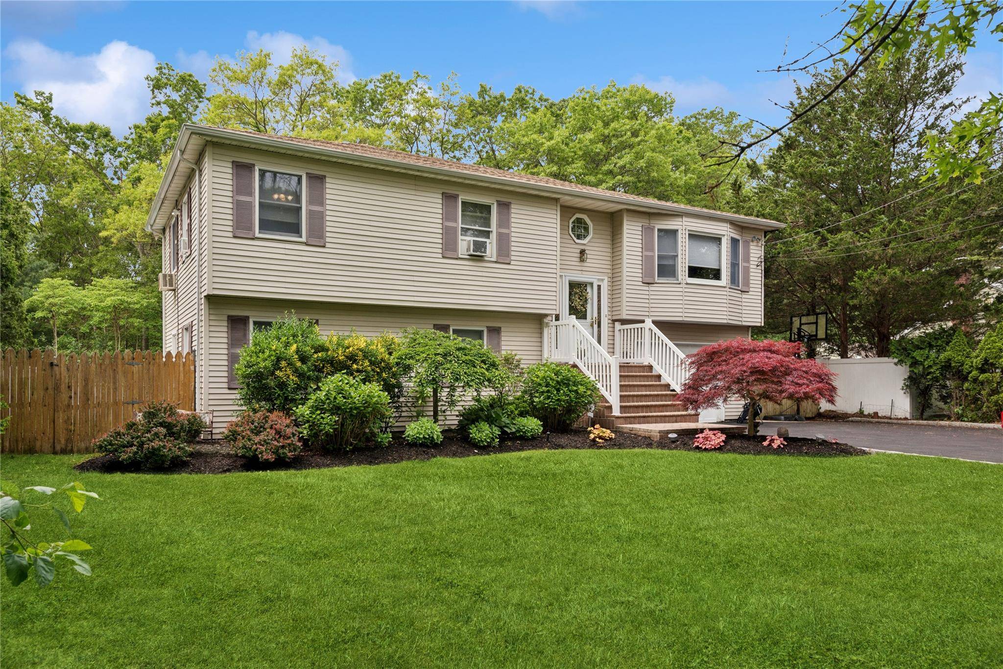 Welcome home to this absolutely spectacular dream home nestled on just shy of an acre of land !