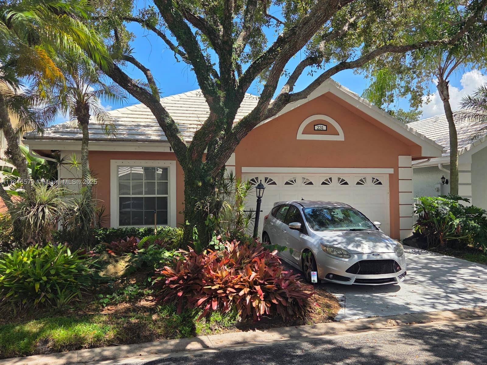 NEW TO THE MARKET 3 2 PONDVIEW HOME IN PRESTIGIOUS CANTERBURY SECTION OF PGA NATIONAL !