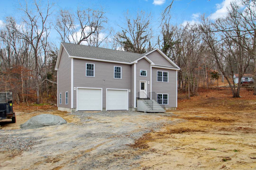 Come see this beautiful new construction situated on a quiet side road with gorgeous field views !