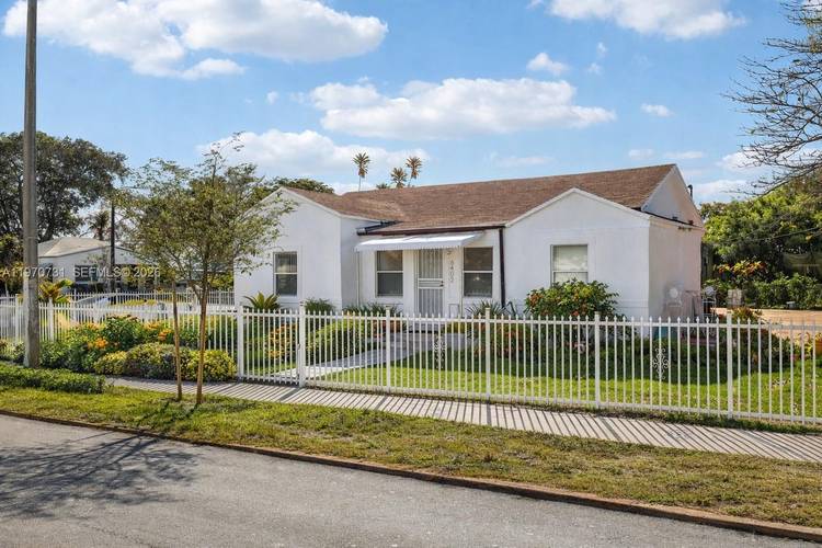 Welcome to this charming 4 bedroom, 2 bathroom home situated on a spacious corner lot in a centrally located neighborhood.