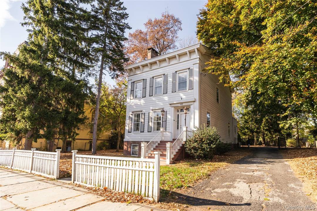 Step into the grandeur of this 1840s masterpiece, situated on an expansive half acre lot.
