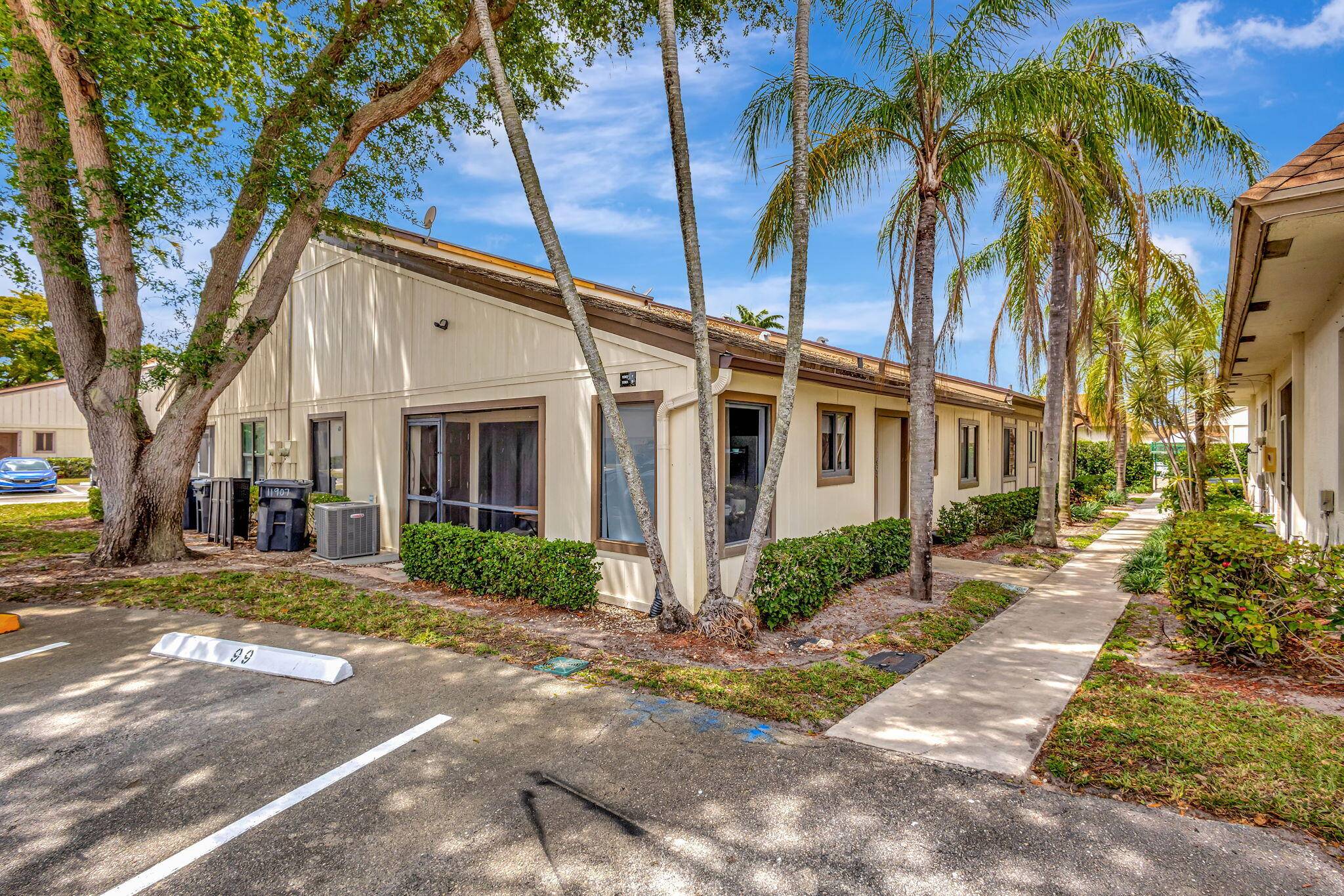 This home features an open floor plan with vaulted ceilings, creating a bright and spacious feel.