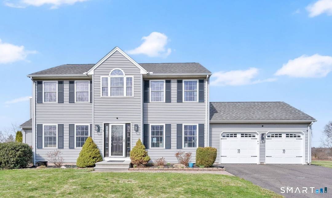 This stunning four bedroom Colonial perfectly blends classic architectural charm with the modern, open concept lifestyle you've been dreaming of.