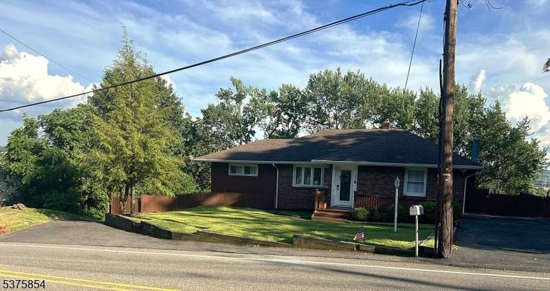 Charming 3 bedroom 3 bathroom ranch style home offering cozy living and stunning mountain views.