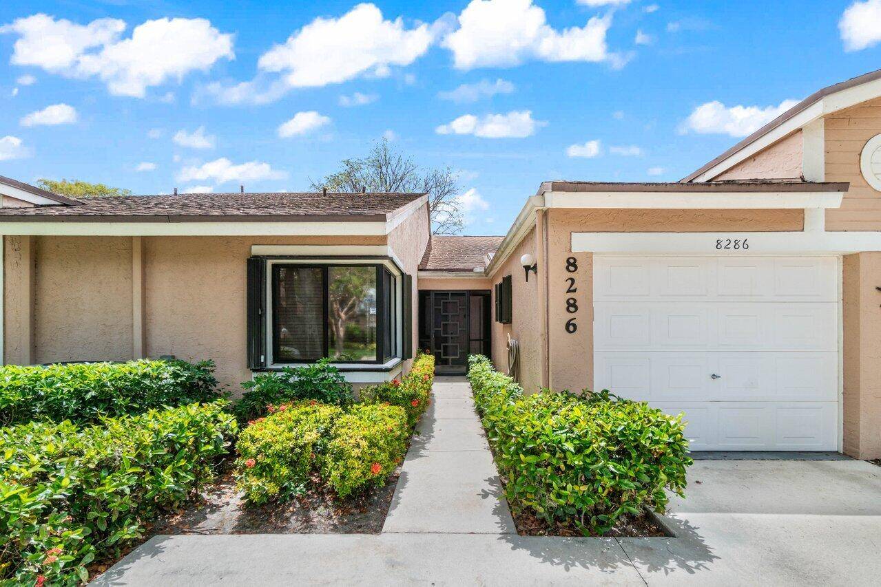 THIS FABULOUS AND RENOVATED 2 BEDROOMS 2 BATHS VILLA WITH GORGEOUS LAKE VIEWS IS LOCATED IN THE VERY DESIRED WHISPER WALK PARKSHORE 55 COMMUNITY.