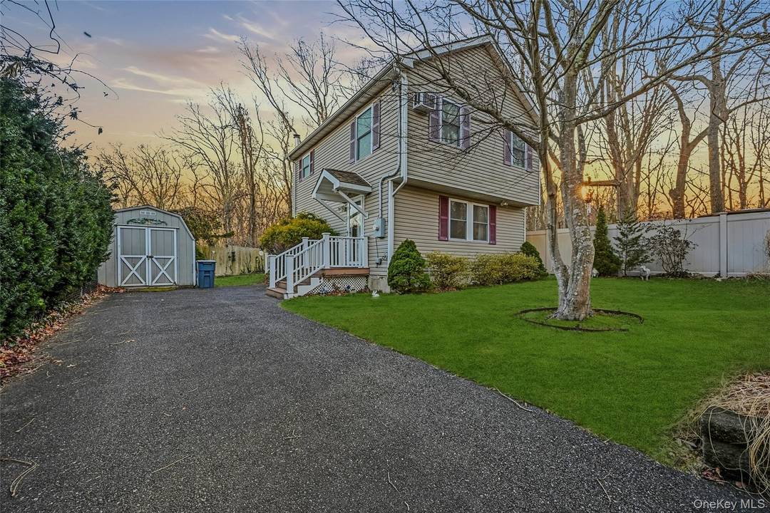Charming Colonial Located in the Wildwood Beach Association in Wading River, New York.