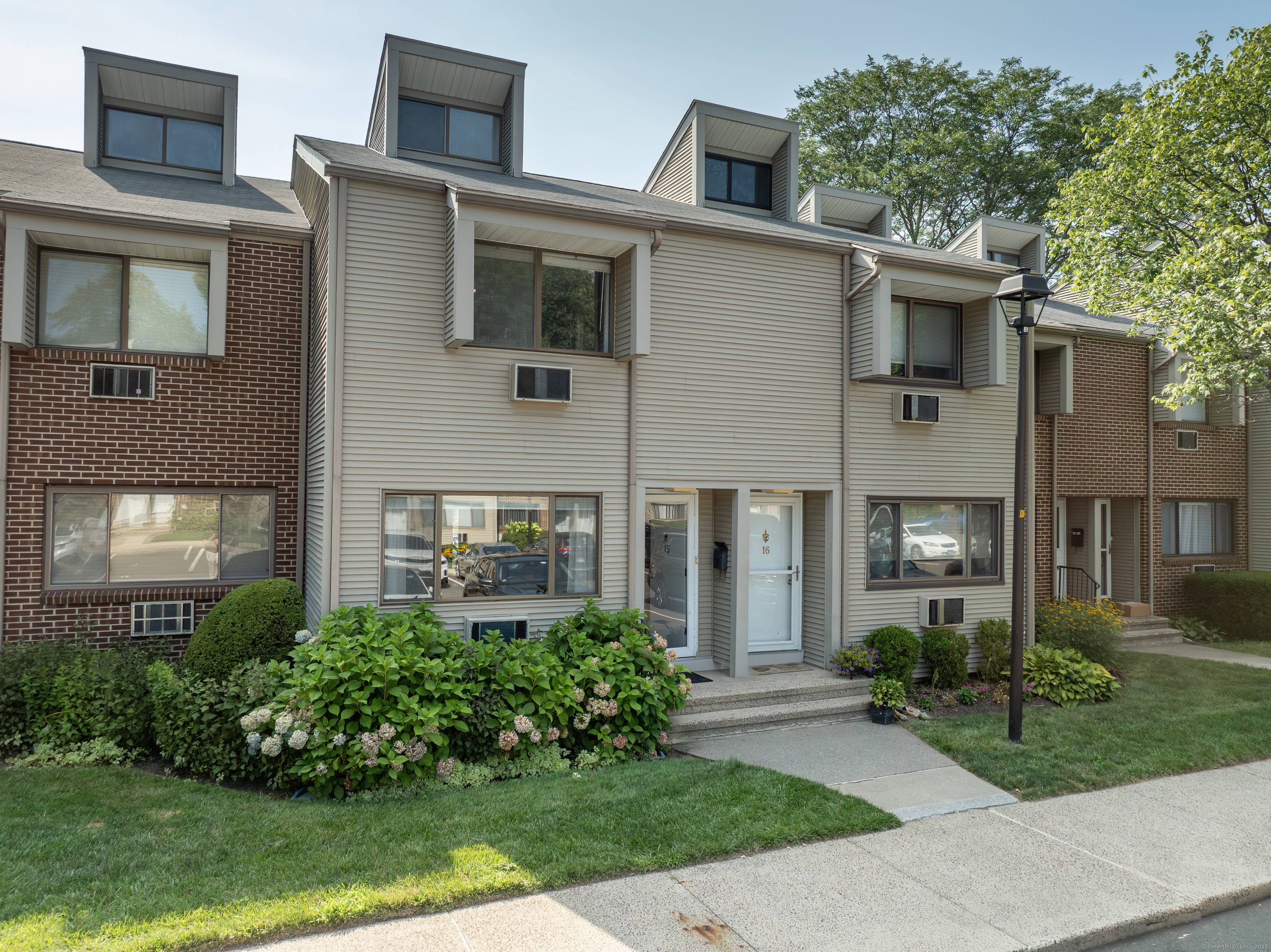 This updated two bedroom townhouse offers the best of both worlds low maintenance living with the feel of a private home.