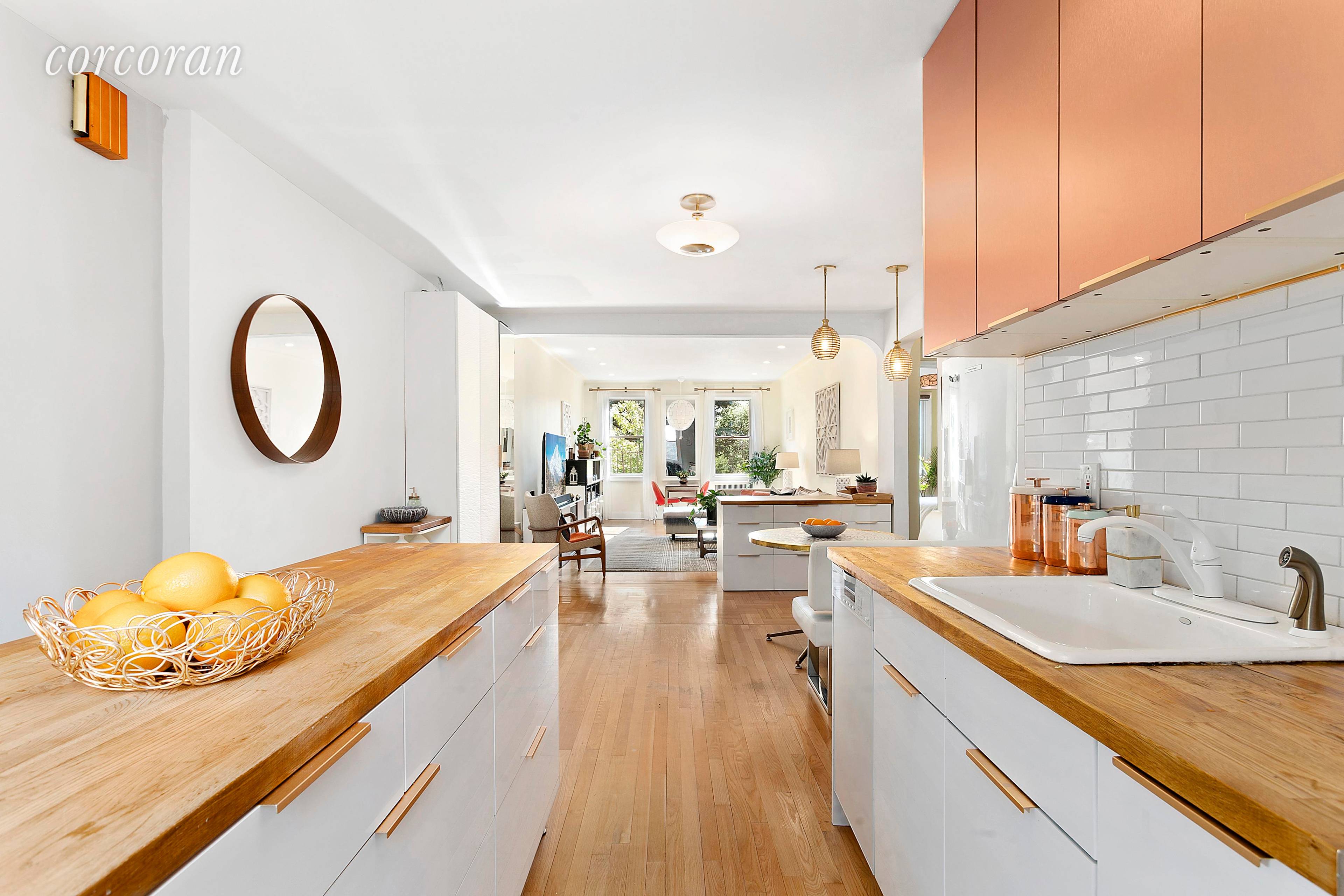 Spacious, sensationally sunny two bedroom one bath coop apartment on the 4th floor in an elevator building building with beautiful views of Prospect Park across the street.