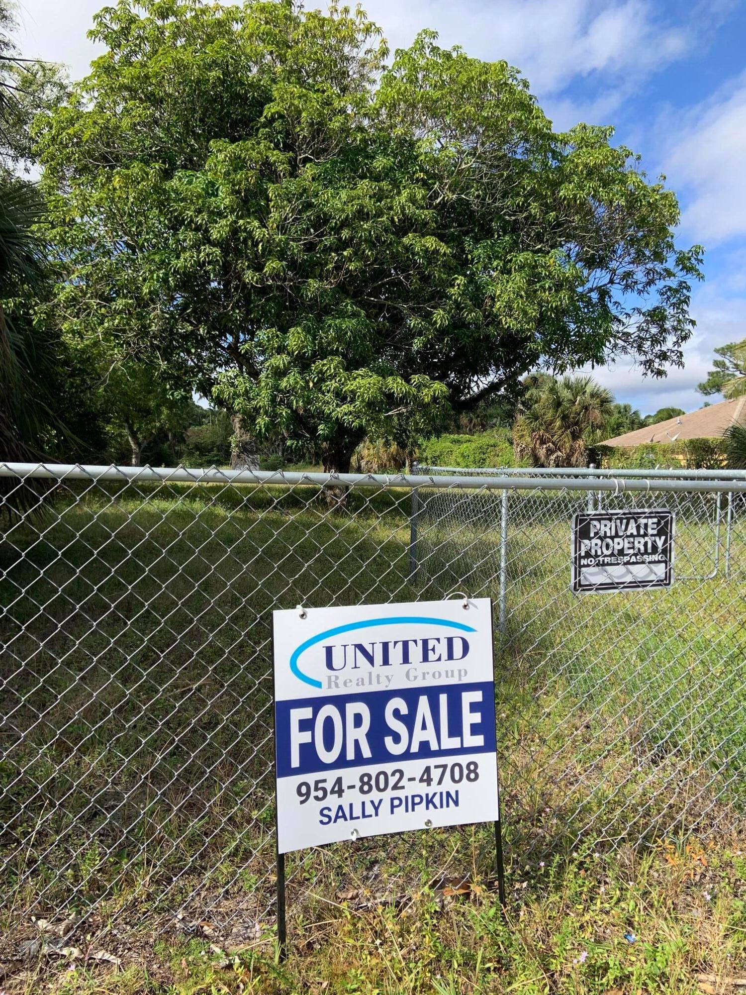 This. 32 acre land lot near PBIA, offers a prime location for building a beautiful residential home.
