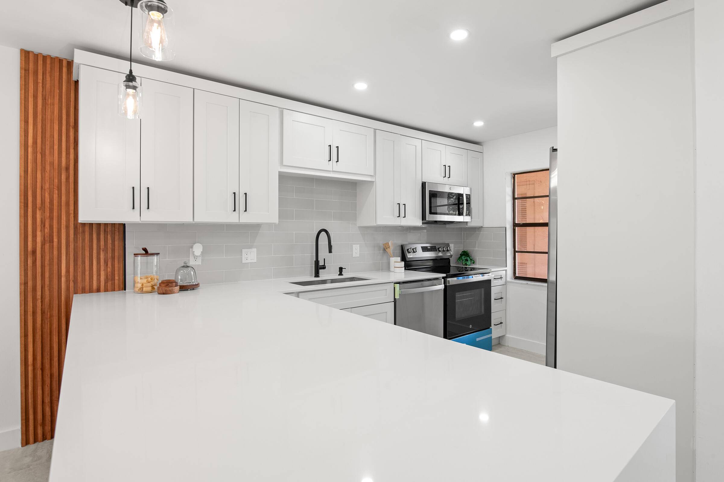 Stunning renovated 2 2 condo overlooking a beautiful lake.