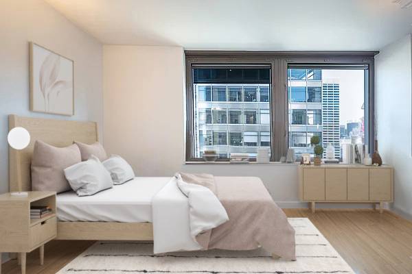 Stunning Junior 1 Bedroom with Bryant Park Views Perched high above the city, this spacious junior 1 bedroom offers breathtaking views of Bryant Park and the Manhattan skyline.