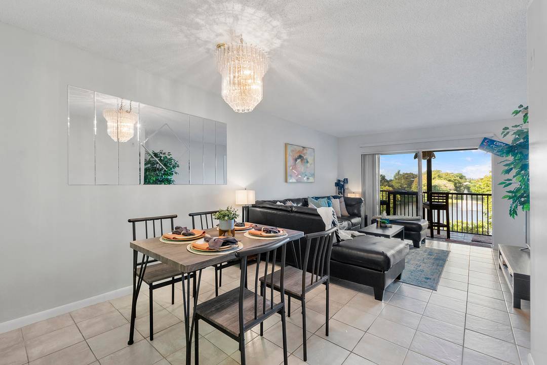 Spacious 2 bedroom, 2 bath condo located in the highly desirable Cypress Bend community, offering a serene lake view from your private screened balcony.