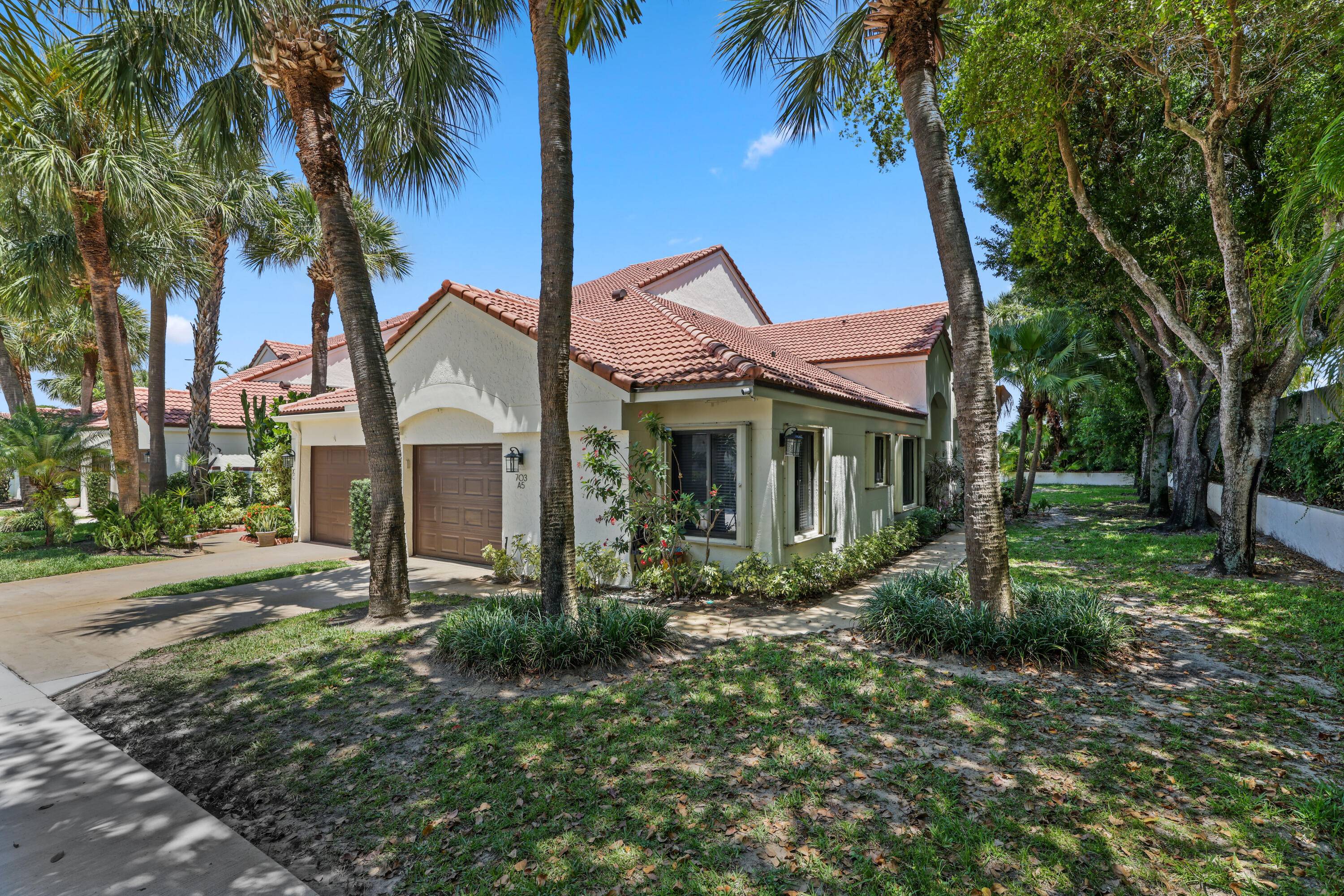 Enjoy the beach lifestyle with privacy in this END UNIT VILLA located in the sought after community of Sea Oats.